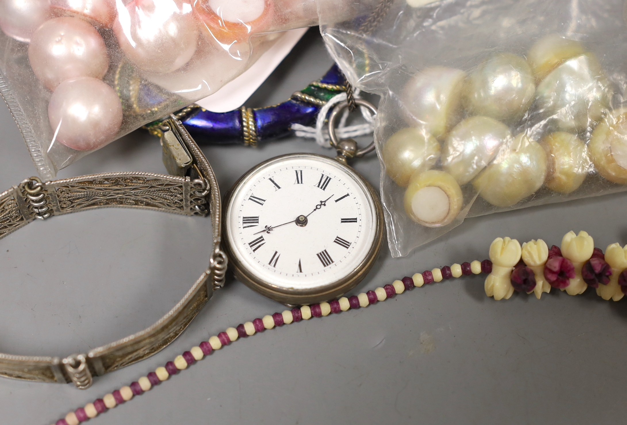 Mixed costume jewellery including filigree bracelet, bangles etc. and other items including two pens and a fob watch.